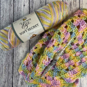 An image of Yarn Bee Soft Secret Ombre yarn for the Premie Lovey crochet pattern by MadameStitch