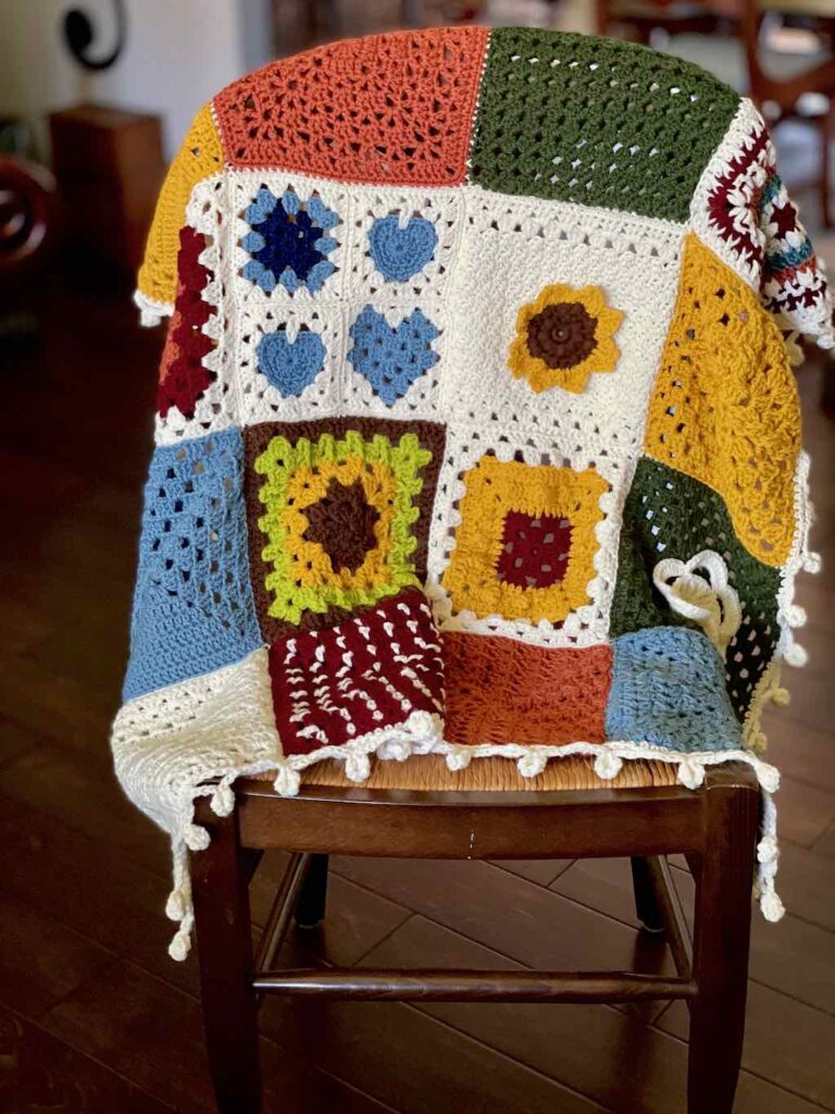 photo of a granny square blanket