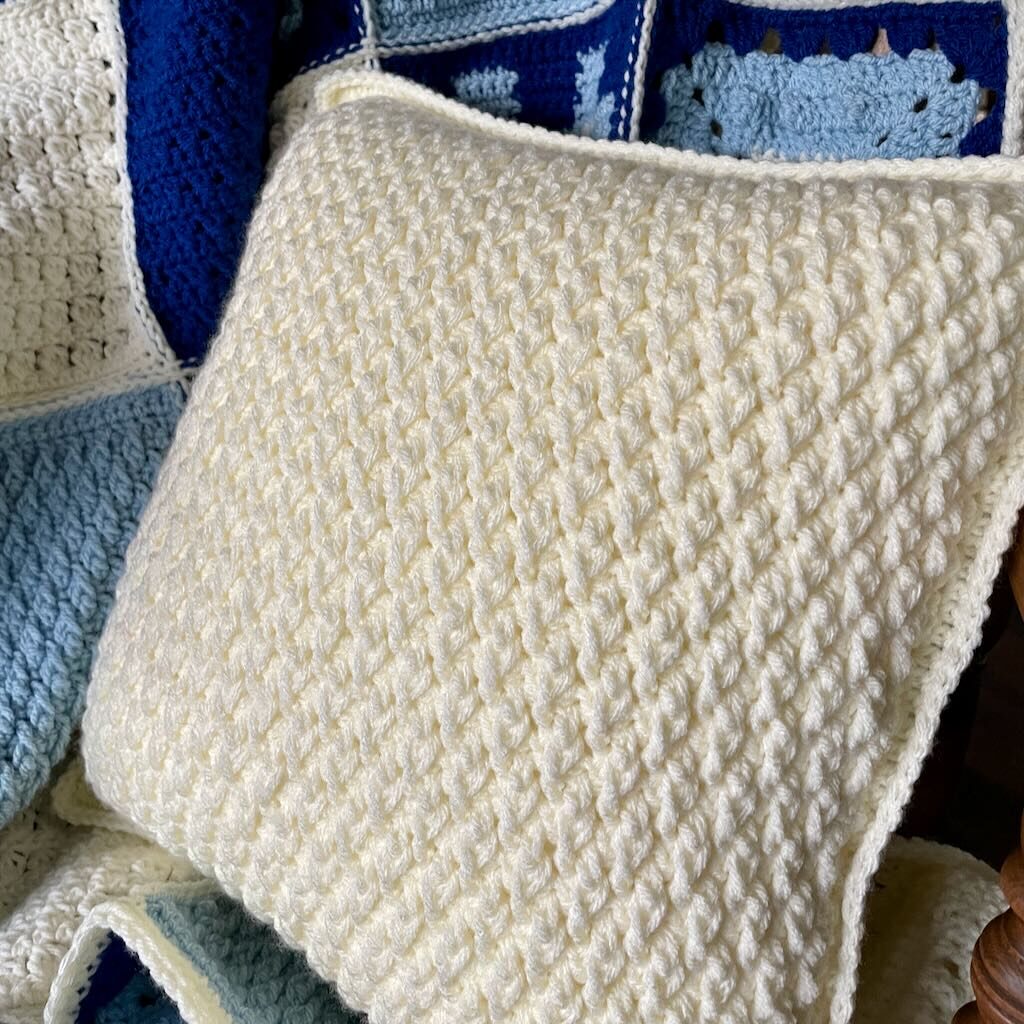 An alpine stitch pillow crochet pattern by MadameStitch