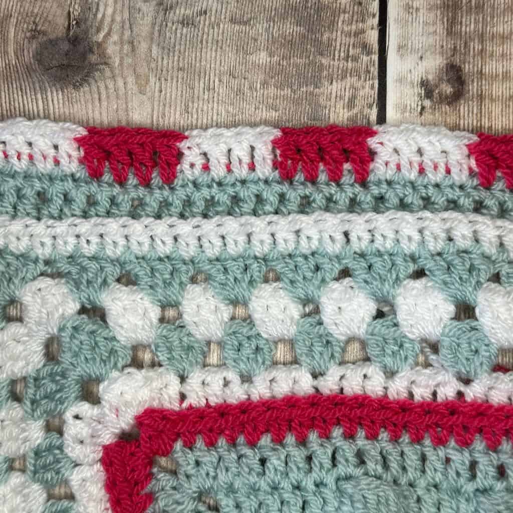 A photo of the border for the Christmas crochet baby blanket | A design by MadameStitch