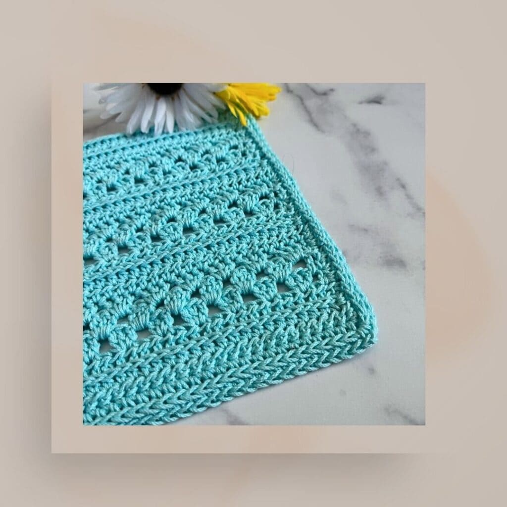 Photo of a turquoise crochet washcloth