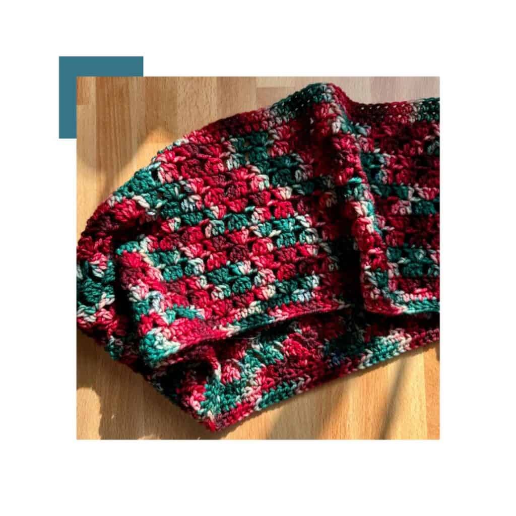 Photo of a Christmas themed crochet cowl