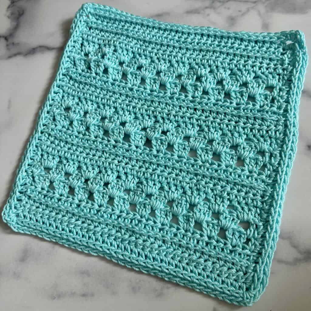 Photo of a turquoise crochet washcloth