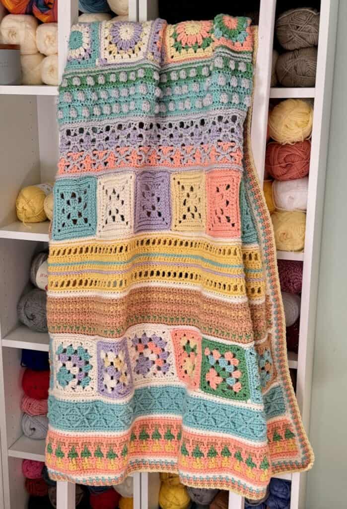 A photo of the Memories Blanket and the mitered afghan square