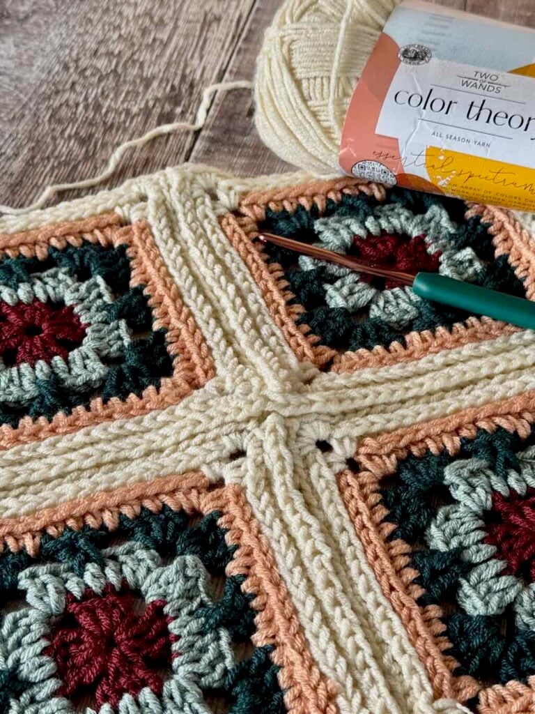 This image shows a closeup of the flat slip stitch seam and the 4 squares sewn in a grid