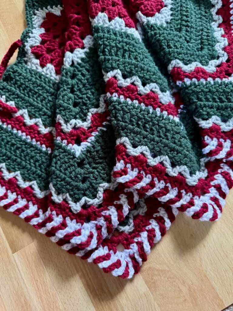 A photo of the Christmas tree skirt folded